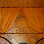Camera con Letto a Baldacchino